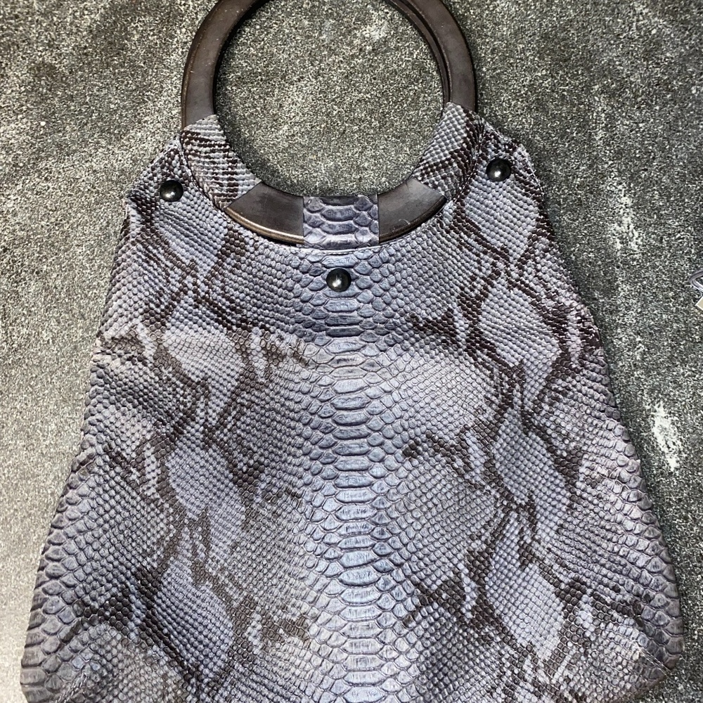 SERIL CLUTCH HANDBAG